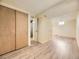 Finished basement area featuring ample closet space and updated flooring, great for storage or living at 1932 S Oswego Way, Aurora, CO 80014
