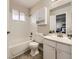 Bathroom featuring shower-tub combination and vanity at 1932 S Oswego Way, Aurora, CO 80014
