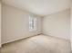 Neutral bedroom with window and carpet at 1932 S Oswego Way, Aurora, CO 80014