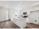 Bright kitchen boasts a center island, modern stainless appliances, and a sleek design at 1368 Penner Dr, Erie, CO 80026