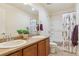 This bathroom features a double sink vanity and a shower-tub combo at 3727 Starry Night Loop, Castle Rock, CO 80109