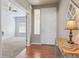Welcoming entryway with wood floors, a console table, and an open doorway to the living area at 3727 Starry Night Loop, Castle Rock, CO 80109