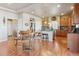 Beautiful kitchen with wood cabinets, stainless steel appliances, granite countertops, and hardwood floors at 3727 Starry Night Loop, Castle Rock, CO 80109