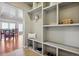 Spacious mudroom with built-in storage, a bench, and access to the rest of the home with tile flooring at 3727 Starry Night Loop, Castle Rock, CO 80109