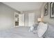 This bedroom features neutral decor and a door with a view into the kitchen at 4274 S Salida Way # 6, Aurora, CO 80013