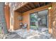 Cozy outdoor patio with seating area and sliding glass doors that leads inside at 4274 S Salida Way # 6, Aurora, CO 80013