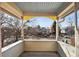 View from the covered front porch with decorative pillars at 2222 Irving St, Denver, CO 80211