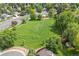 Aerial view of community park and playground with green space and recreation areas at 10694 E Dorado Ave, Englewood, CO 80111