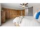 Bedroom featuring closet space and a rustic door leading to the Primary bath at 10694 E Dorado Ave, Englewood, CO 80111