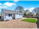 Fenced backyard featuring a patio, grass area, and gravel at 5280 E 128Th Way, Thornton, CO 80241