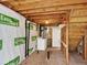 Unfinished basement with exposed beams, utility hookups, and white painted walls at 5280 E 128Th Way, Thornton, CO 80241