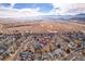 A high angle aerial view of houses in the suburbs at 9593 Racoon Pl, Littleton, CO 80125