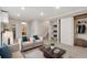 Bright bedroom featuring neutral tones, large closet, carpet and a doorway to the ensuite bathroom at 10535 Holyoke Dr, Parker, CO 80134