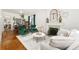 Bright living room with fireplace, hardwood floors and comfortable seating at 3016 N Franklin St, Denver, CO 80205