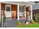 Inviting front porch features classic columns and comfortable seating at 3016 N Franklin St, Denver, CO 80205