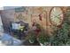 Welcoming front porch featuring a cozy bench with decorative pillows, colorful flowers, and decorative outdoor accents at 3016 N Franklin St, Denver, CO 80205