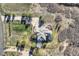 An aerial view of the house highlighting the lush landscaping at 1289 Diamond Ridge Cir, Castle Rock, CO 80108
