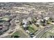 Drone shot of estate including the home, a long driveway, and natural scenery at 1289 Diamond Ridge Cir, Castle Rock, CO 80108