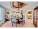 Charming dining room featuring decorative chairs, a decorative ceiling, and a chandelier at 1289 Diamond Ridge Cir, Castle Rock, CO 80108