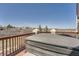 Outdoor deck features a private hot tub, offering a tranquil space to unwind and enjoy scenic views at 1289 Diamond Ridge Cir, Castle Rock, CO 80108