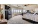 Spacious main bedroom features a large window, dresser, and carpeted flooring at 1289 Diamond Ridge Cir, Castle Rock, CO 80108