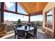 Outdoor dining area on the deck, offering scenic views at 6170 Falcon Ln, Morrison, CO 80465