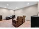 Spacious entertainment room with comfy seating, a media console, and recessed lighting at 6170 Falcon Ln, Morrison, CO 80465
