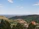 Scenic landscape view with mountains and greenery at 6170 Falcon Ln, Morrison, CO 80465