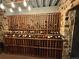 Wine cellar boasts extensive bottle storage and rustic stone walls at 6170 Falcon Ln, Morrison, CO 80465