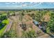 Aerial view of property showing land, outbuildings, and mountain views at 10690 County Road 1, Longmont, CO 80504