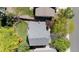 Aerial view of the home's roof and backyard, showcasing the well-maintained lawn and patio area at 16225 Peregrine Dr, Parker, CO 80134