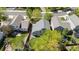 Aerial view of a home with a spacious backyard, patio, and well-maintained landscaping at 16225 Peregrine Dr, Parker, CO 80134