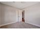 Neutral bedroom with closet and carpet flooring at 6528 S Louthan St, Littleton, CO 80120