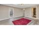 Bedroom with a door to the backyard and a view of the bathroom at 6528 S Louthan St, Littleton, CO 80120