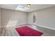 Bedroom with a skylight and a door to the backyard at 6528 S Louthan St, Littleton, CO 80120