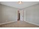Neutral bedroom with closet and carpet flooring at 6528 S Louthan St, Littleton, CO 80120
