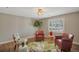 Comfortable living room with natural light and elegant furnishings on hardwood floors at 6528 S Louthan St, Littleton, CO 80120