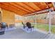 Inviting backyard patio with stylish furniture and wood ceilings, offering a relaxing outdoor space at 11420 E 1St Ave, Aurora, CO 80010