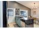 Bright kitchen with island and dining area at 11420 E 1St Ave, Aurora, CO 80010