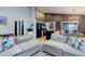 Living room with open view of kitchen area and dining area at 11420 E 1St Ave, Aurora, CO 80010