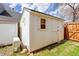 Exterior shot of a small storage shed in the backyard of a home at 11420 E 1St Ave, Aurora, CO 80010