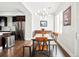 Dining room with modern lighting and a view into the kitchen space at 3444 Navajo St # 10, Denver, CO 80211