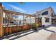 Inviting outdoor dining area with charming wooden accents and string lights at 3444 Navajo St # 10, Denver, CO 80211