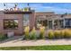 Inviting exterior featuring brickwork and well-maintained landscaping at 3444 Navajo St # 10, Denver, CO 80211