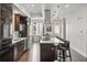 Well-lit kitchen featuring a spacious island, stainless steel appliances, and modern cabinets at 3444 Navajo St # 10, Denver, CO 80211