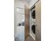 Conveniently located stacked washer and dryer next to a bedroom at 3444 Navajo St # 10, Denver, CO 80211