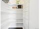Well-organized pantry with multiple shelves for ample storage at 3444 Navajo St # 10, Denver, CO 80211