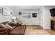 Comfortable living room featuring hardwood floors and a cozy sitting area at 26095 Columbine Trl, Kittredge, CO 80457