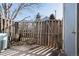 Small backyard with wooden fence and concrete patio at 1711 S Blackhawk Way # D, Aurora, CO 80012