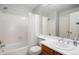 Clean bathroom with shower/tub combo, vanity, and a large mirror at 1711 S Blackhawk Way # D, Aurora, CO 80012